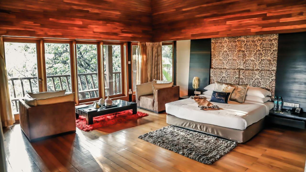 ホテル アンビー バレー シティ ロナバラ エクステリア 写真 A bedroom at the Taj Bengal